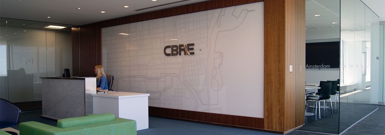 Receptionist area and waiting room inside the CBRE building in Milwaukee, WI, a Tri-North Builders project.
