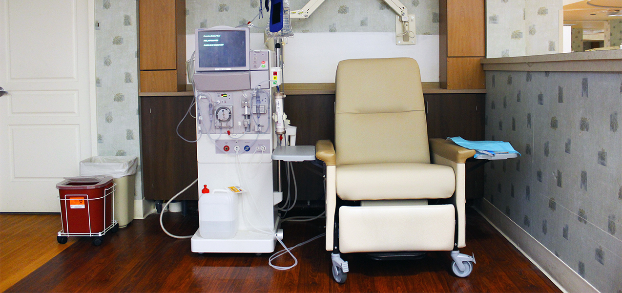 Dialysis machine and treatment area in the Tri-North Builders remodeled Fresenius Kidney Care building in Illinois.