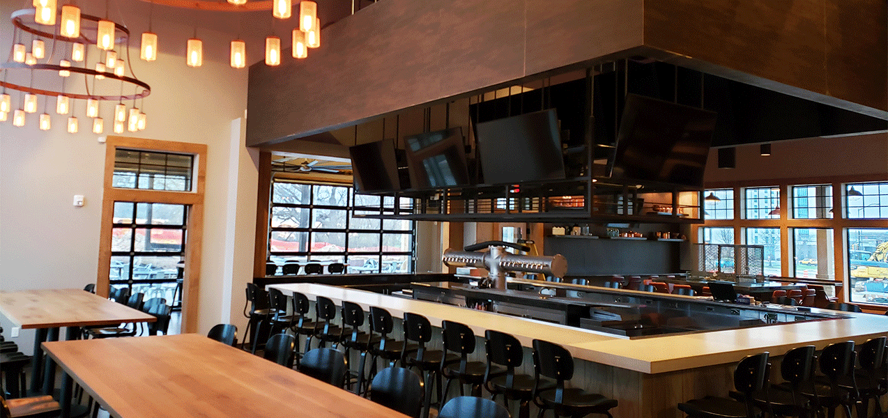 Interior of Liberty Station Restaurant showcasing the bar as built by Tri-North Builders.