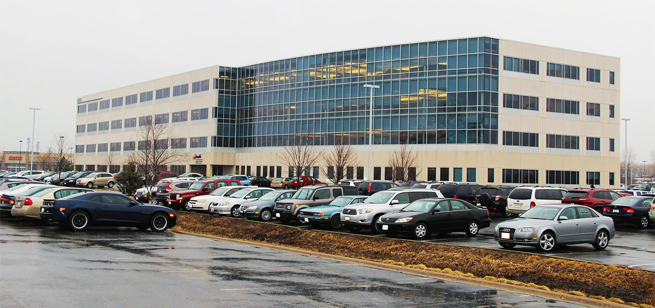 UW Health office in Wisconsin showing the parking lot and building by Tri-North Builders.