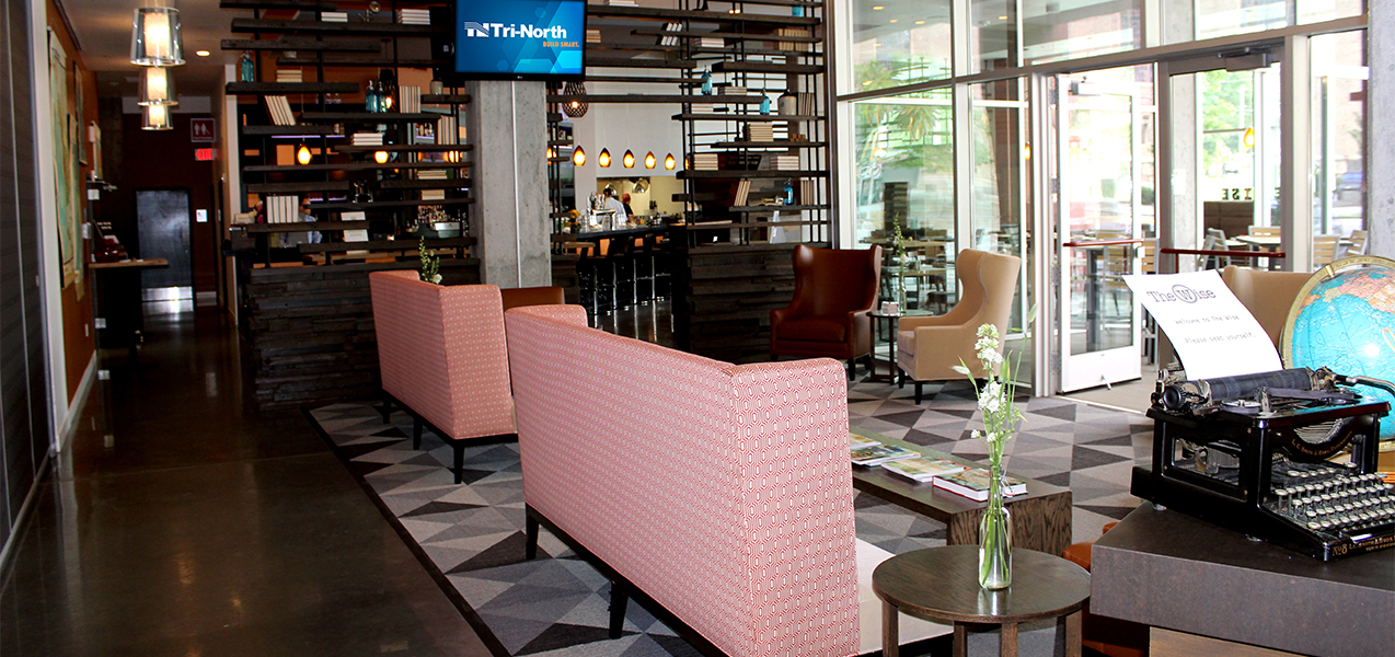 Indoors of The Wise at Hotel Red including front entrance, bar, seating area built by Tri-North Builders in Madison.